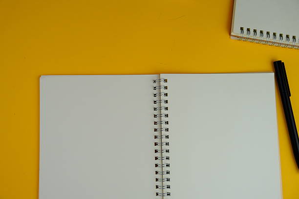 istock Blank note paper on isolated background as a notice, remark, note or announcement concept. text space. 2216618467