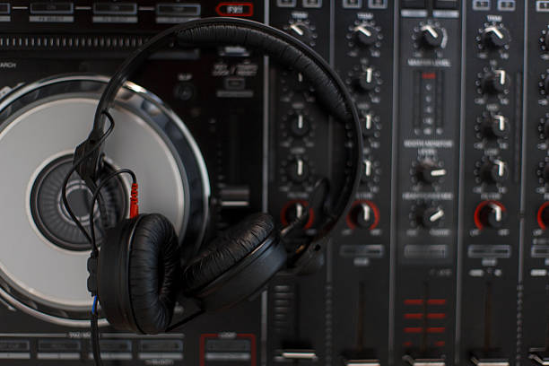 Close up of a professional dj mixer with headphones, close up.