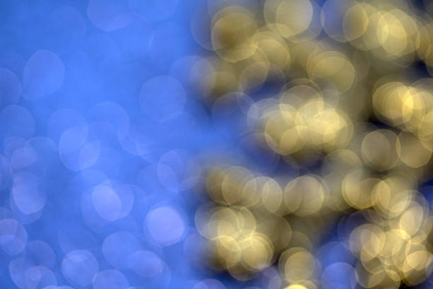 Blue-yellow blurred background visually divided into two color zones, warm tone, festive New Year mood.