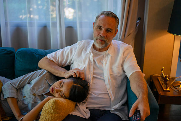 istock Couple are resting in living room. 2216621399