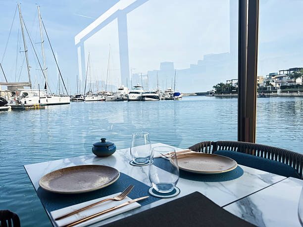 istock Scenic dining experience at waterfront restaurant overlooking cyprus marina for summer leisure 2216623626