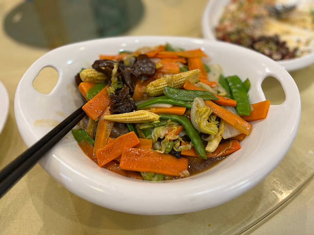 istock Stir-fried mixed vegetables with mushrooms served in a Chinese restaurants 2216624799