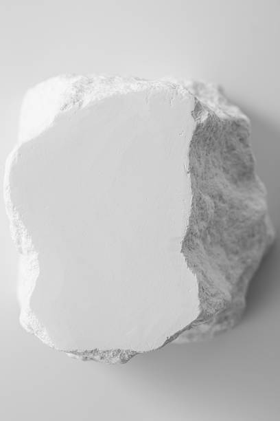 istock White Rock on Gray Background with Smooth Surface and Textured Edges 2216626724