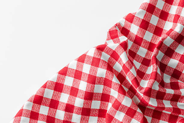 istock Red and White Checkered Tablecloth Fabric Background Detail 2216626790