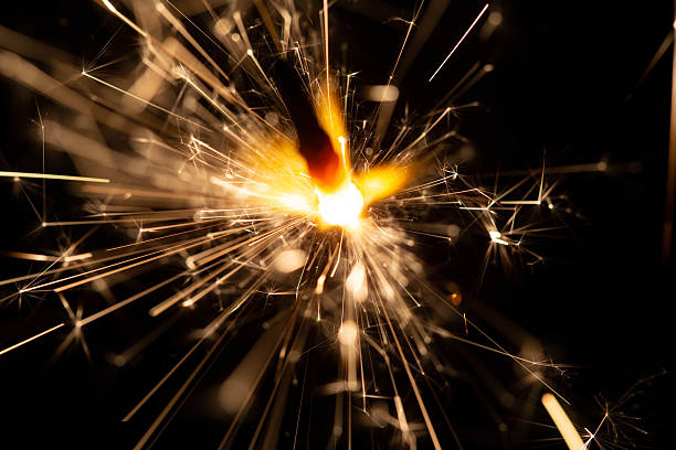 istock Bright Sparkler Igniting in the Dark with Radiant Sparks and Glowing Light 2216626825