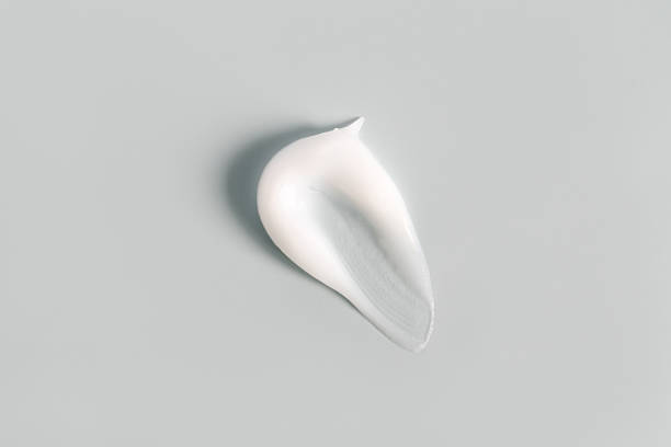 istock cosmetic cream smear on a light background 2216630386
