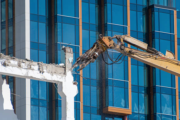 Deconstruction site with tearing down apartment building by excavator at Swiss city of Zürich on a late summer day. Photo taken September 9th, 2025, Zurich, Switzerland.
