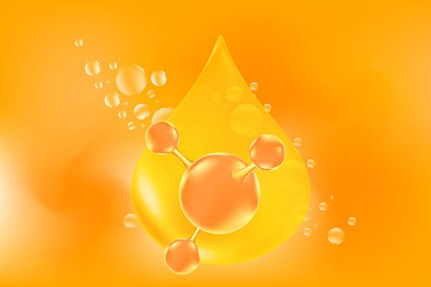 istock Yellow 3d oil drop or collagen droplet molecule formula, with gold liquid particles, bubbles pattern. Hyaluronic acid serum chemical formula orange background with copy space. Beauty treatment 2216638543