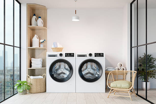 istock Laundry room design featuring modern washing machines and storage solutions. 3D render illustration 2216638696