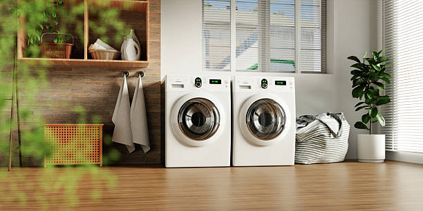 istock Home laundry design featuring sleek white washing machines. 3D render illustration 2216639448