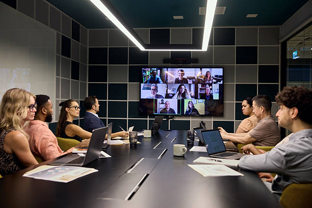 istock Group of entrepreneurs in virtual meeting at office 2216640567