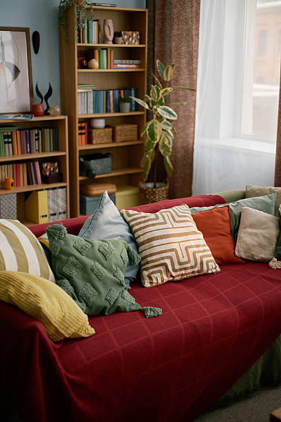 istock Cozy Living Room with Assorted Pillows on Couch 2216640643