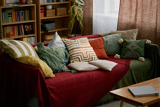 istock Cozy Living Room Decorated with Vibrant Cushions 2216640650
