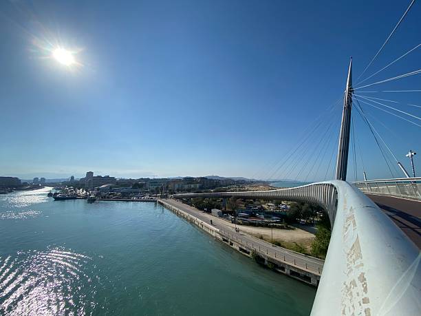 Modern cable-stayed bridge Ponte del Mare in Pescara, Italy, spanning the Pescara River and connecting the port with the southern beach