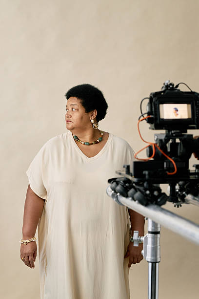 istock Digital Camera Capturing Portrait of Plus Size Female Model 2216644903