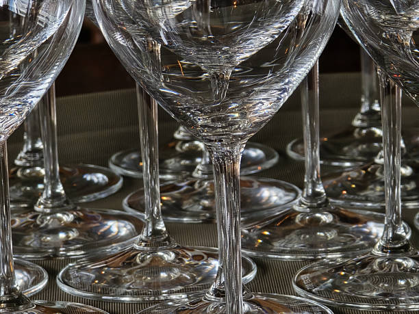 istock Clear glass wine glasses arranged elegantly on table, showcasing their intricate design and reflections. image captures beauty and clarity of glassware, perfect for any dining occasion 2216645469