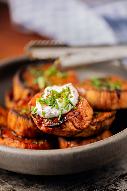 Butter roasted sweet potato slices.