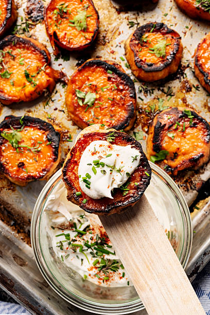 istock Butter roasted sweet potato slices. 2216646377