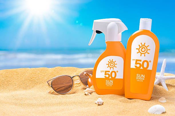 istock two bottles of sun cream lotion on the beach 2216654757