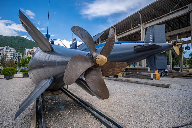 Tivat, Montenegro. 13 May 2025. Historic military submarines, on the harbour edge, in Tivat in Montenegro