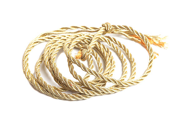 Golden rope isolated on a white background.