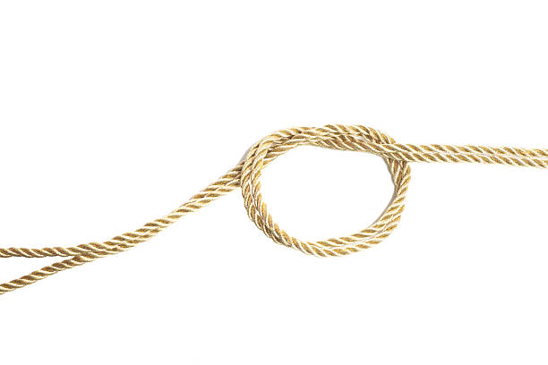 istock Golden rope isolated on a white background 2216664704