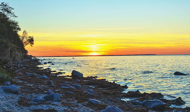 istock romantic sunset on the Baltic Sea beach 2216666792