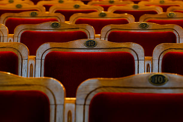 istock Row of red seats in theatre 2216671807