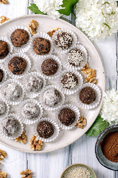 istock raw vegan balls Truffles Assortment on White Plate 2216674988