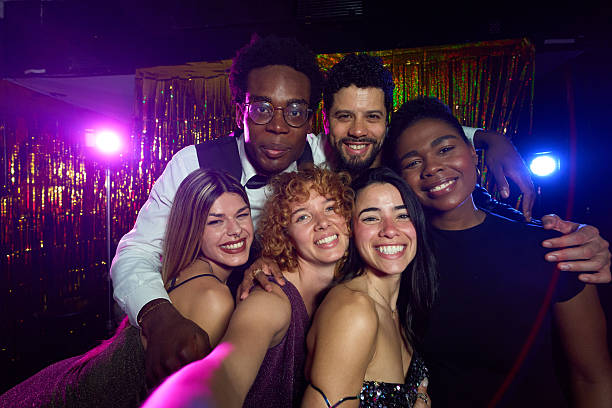 istock Group of friends taking selfie at the disco 2216676090