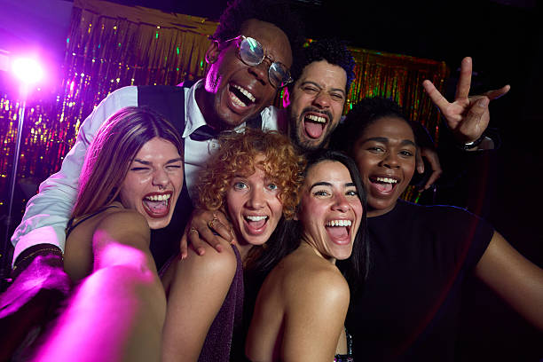 istock Group of friends celebrating at a party 2216676111