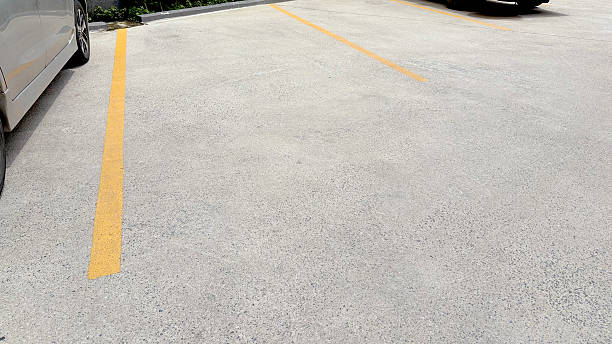 istock Yellow traffic lines for outdoor parking 2216679168