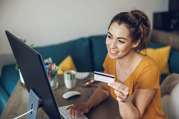 istock Woman Using Credit Card Online 2216679170