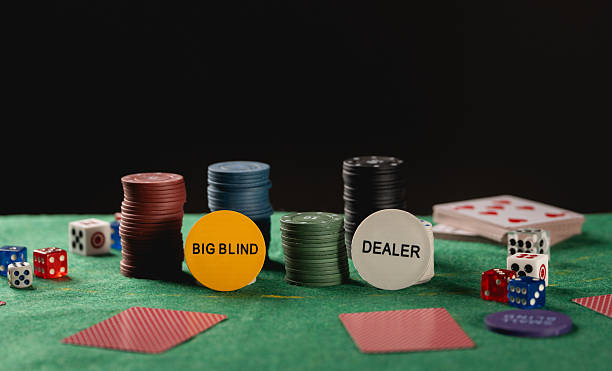 istock Colorful poker chips, dice, and playing cards set up on a green felt table creating a vibrant gaming atmosphere for casino-themed activities and events 2216681209