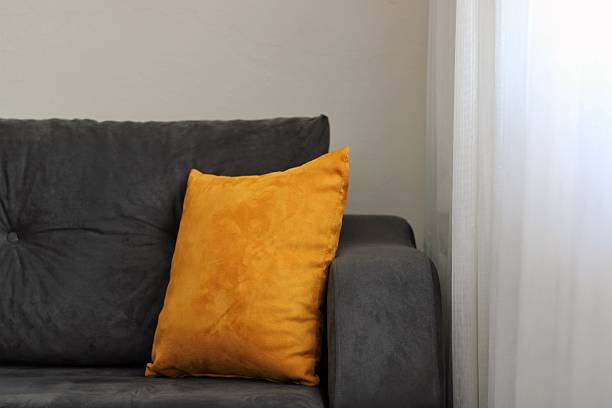 istock Cozy Home Interior with Velvet Sofa and Yellow Pillow 2216683458