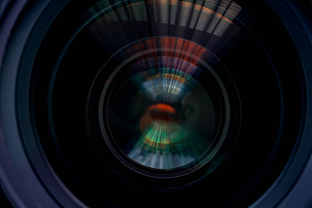 istock Close-up camera lens,Photo Camera or Video lens close-up on black background, objective, concept of photographer camera man job, looking for a photographer, 2216686640