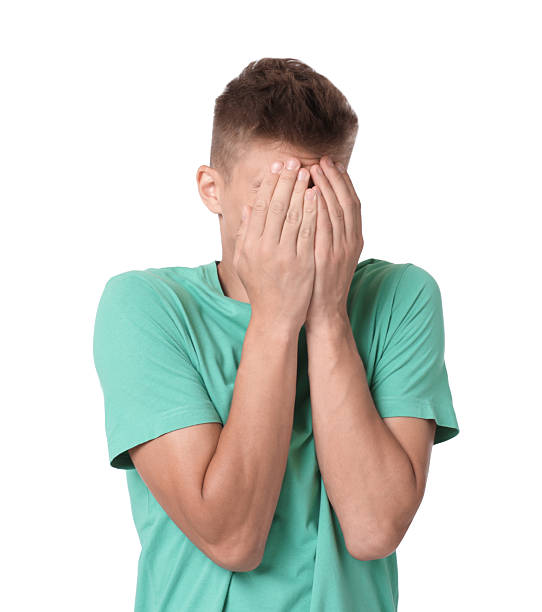 istock Portrait of scared young man on white background 2216692853