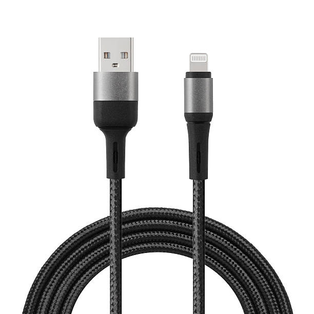 Black cable for charging and synchronization with USB and Lightning connectors on a white isolated background