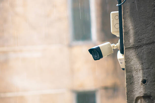 istock Surveillance Camera on a Rainy Urban Day 2216702908