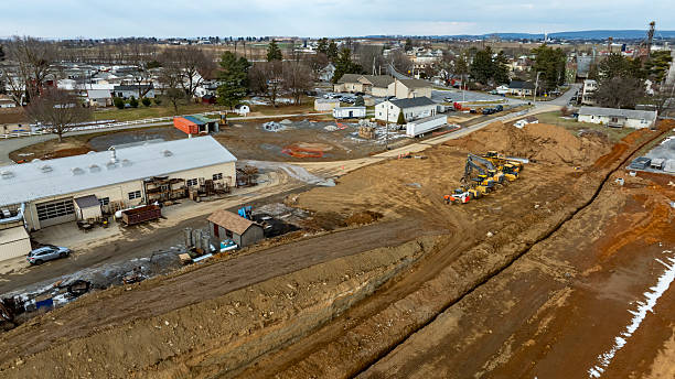 istock Construction Site Shows Heavy Machinery at Work on a Transformation Project in a Suburban Area During Early Afternoon 2216714106