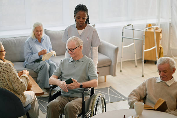istock Caring for Elderly People in Assisted Living Facility 2216717949