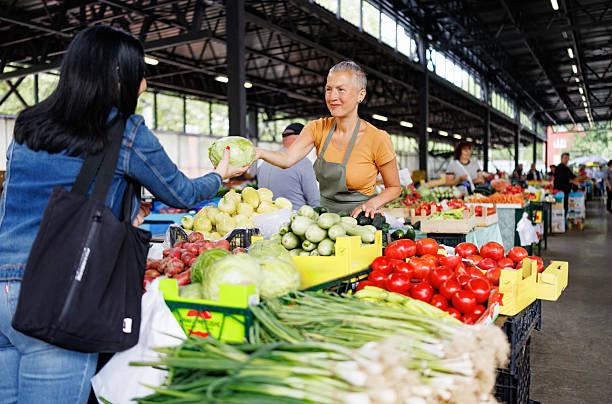 istock Everyday Connections at the Vegetable Stall 2216724332