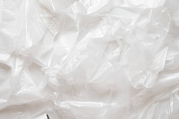 istock Background of crumpled white polyethylene bags, plastic texture for design, ecology 2216724493