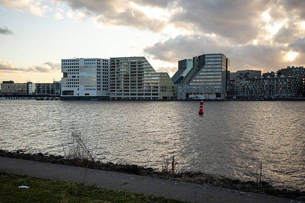 istock Skyscrapers in Amsterdam at sunset 2216726382