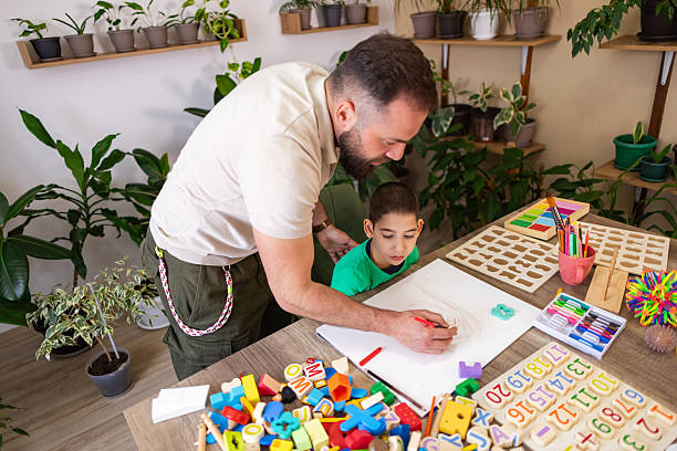 istock Peaceful Art Time with Child with Autism 2216727293