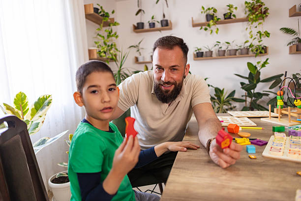 istock Father and Autistic Son Portrait 2216728846