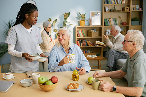istock Serving Tea and Snacks at Senior Community Center 2216734818