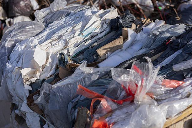 istock Various types of recyclable materials are stacked together at a waste management facility, showcasing the importance of recycling efforts 2216735882
