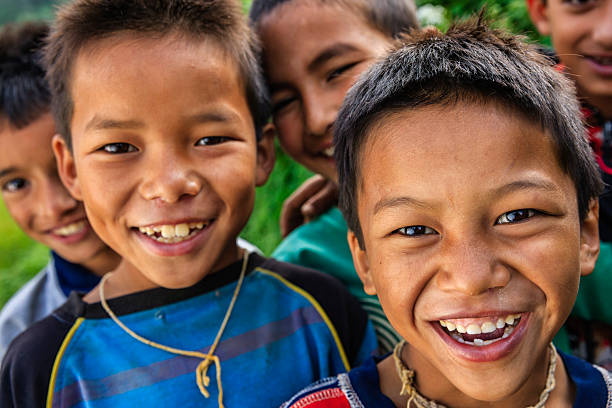 istock Happy Nepali boys near Annapurna Range 2216736313