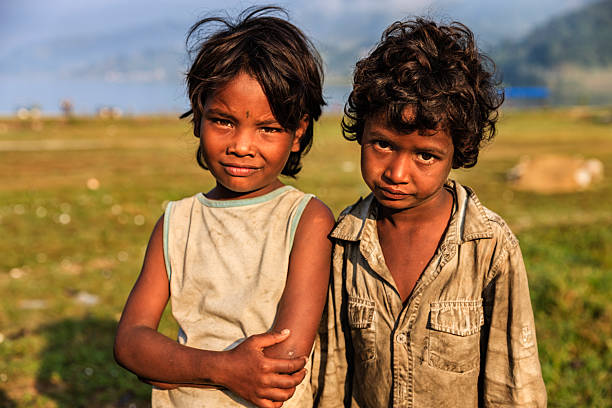 Happy Indian children in Pokhara. Pokhara is the second largest city of Nepal. The Annapurna Range with three out of the ten highest mountains in the world — Dhaulagiri, Annapurna I and Manaslu — are within approximately 60 kilometers of the valley. Pokhara is a base for trekkers undertaking the Annapurna Circuit through the ACAP region of the Annapurna ranges in the Himalayas.
